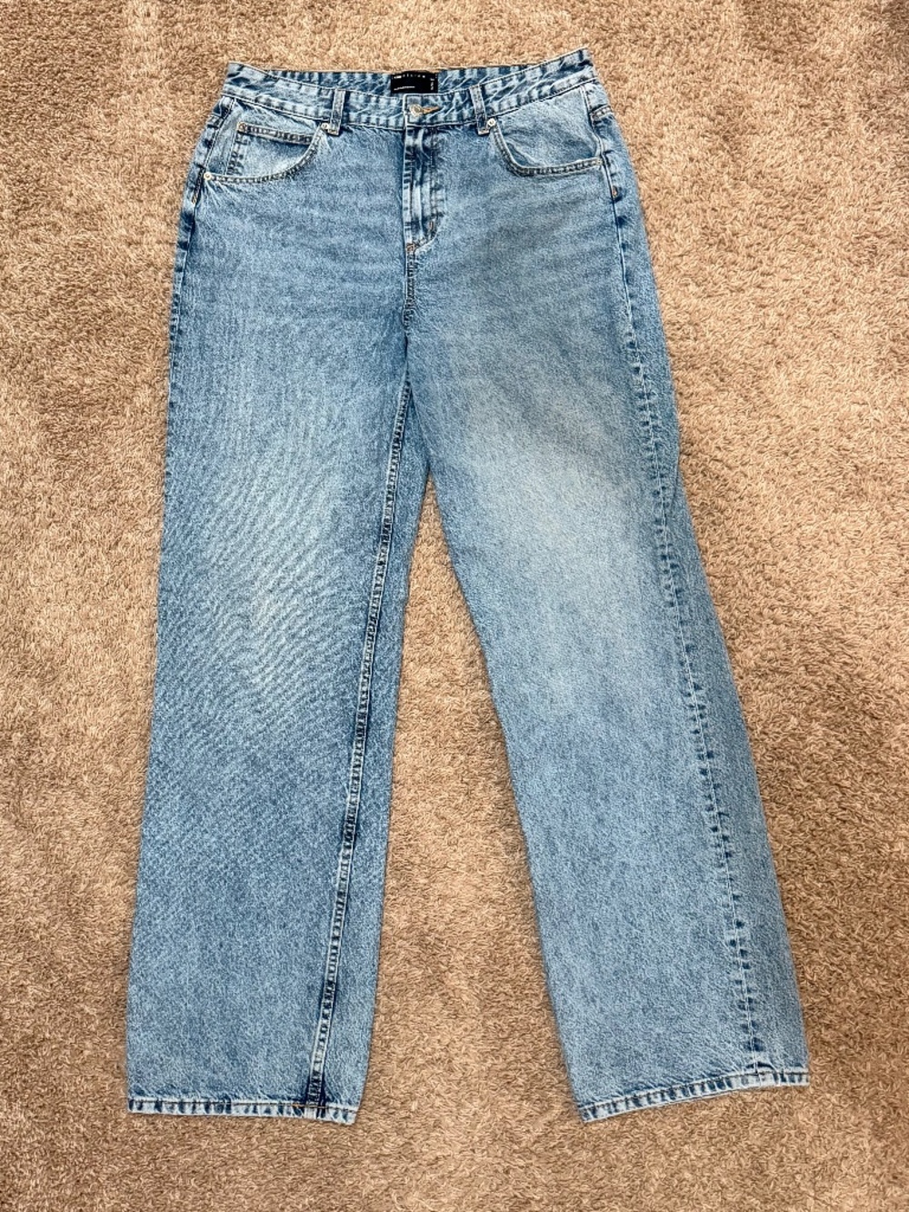 ASOS Design tall low rise baggy jeans in mid blue